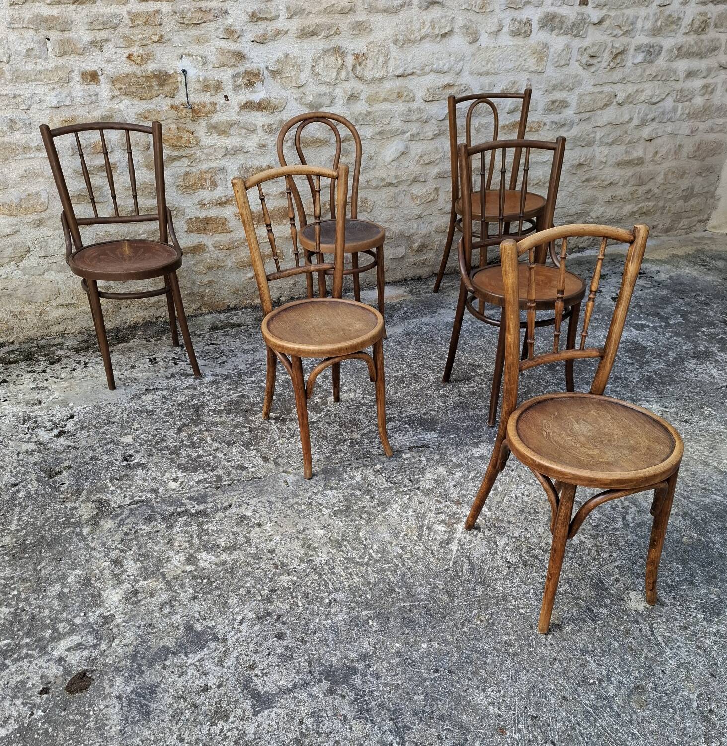 6 mismatched bistro chairs