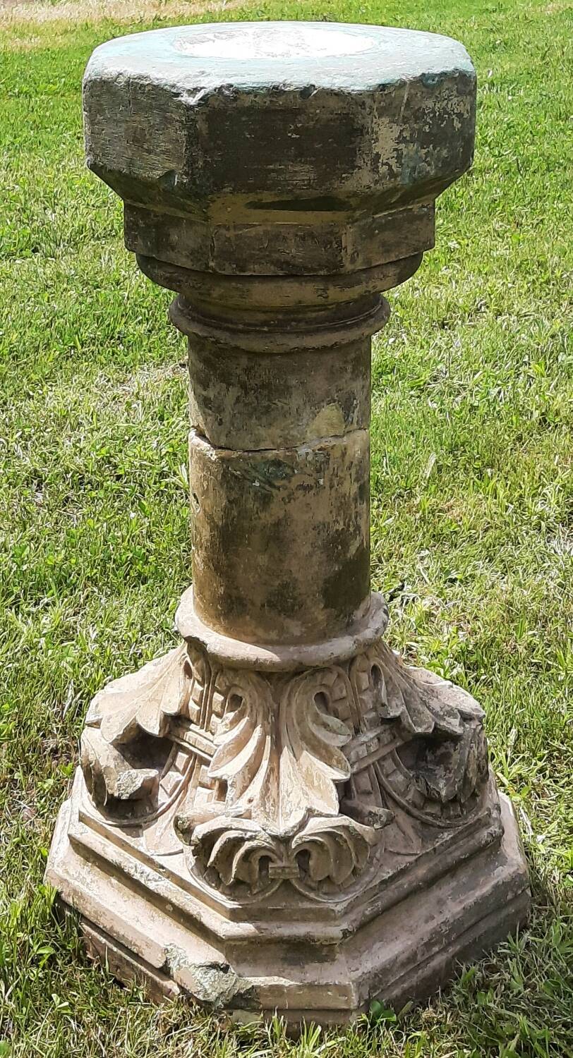 Holy water font on stone column (17th century)