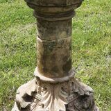 Holy water font on stone column (17th century)