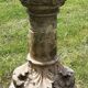 Holy water font on stone column (17th century)