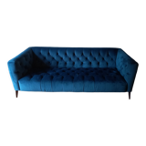 Royal blue velvet upholstered sofa