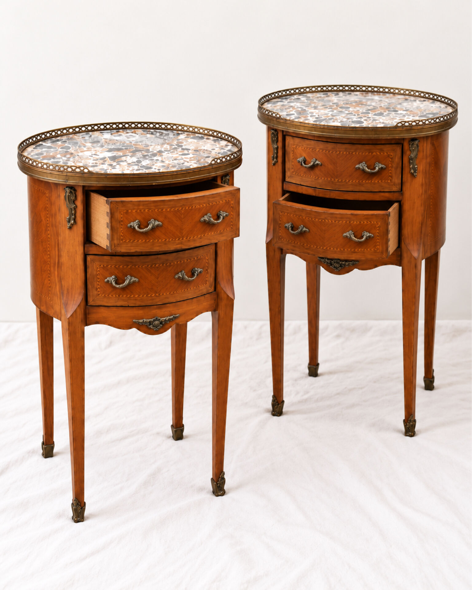 Pair of bedside tables with marquetry and marble, Louis XV style, openwork gallery.