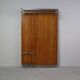 Modernist wall-mounted cloakroom in teak