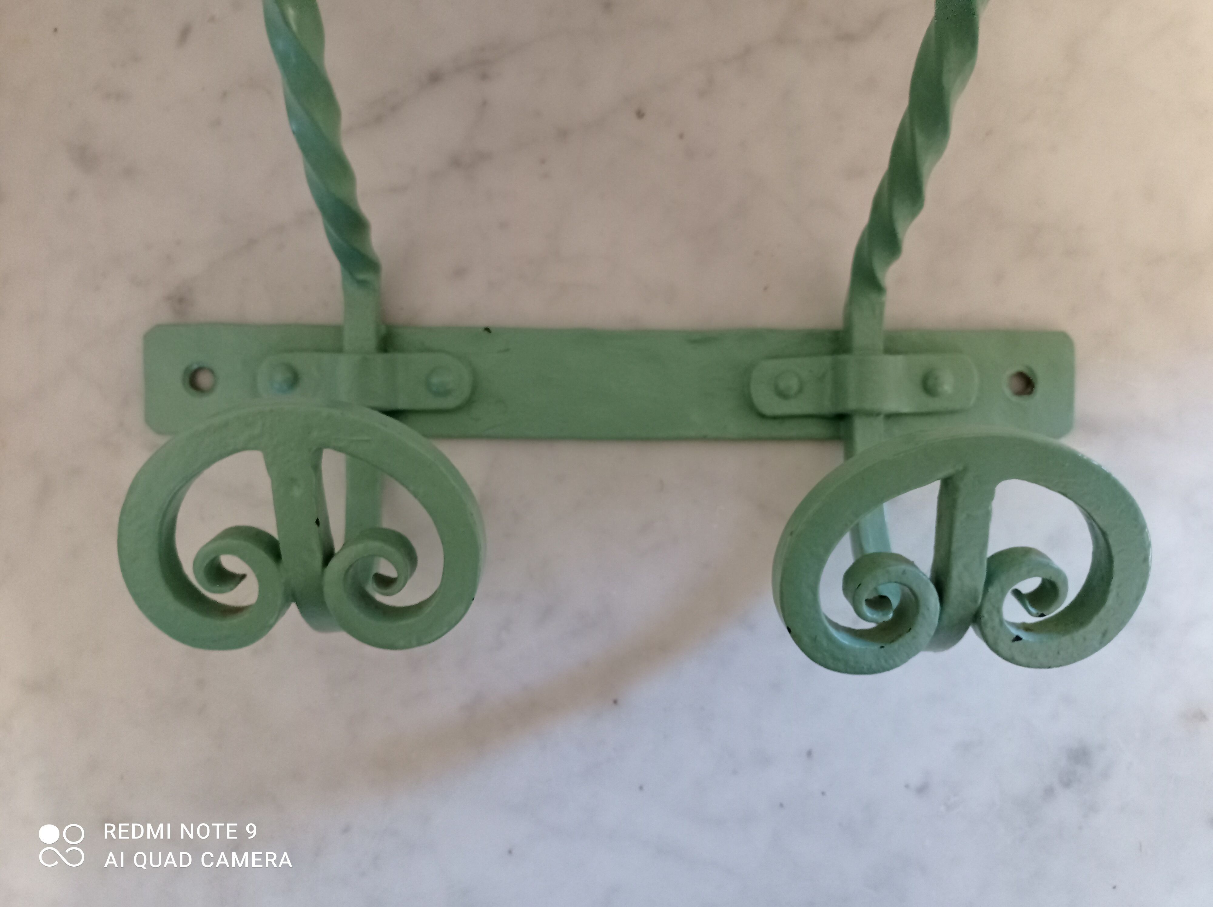 Double wrought iron coat hooks