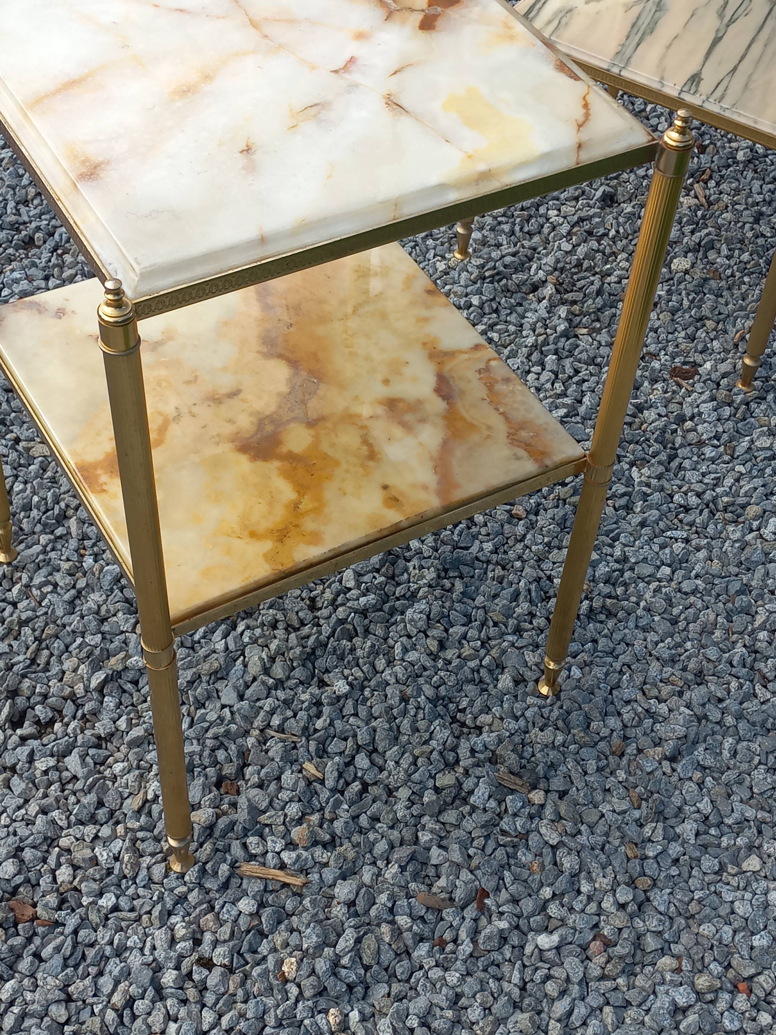 Pair of neoclassical side tables in bronze, brass, marble, and o.