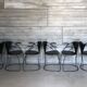 “Armlinda” black leather dining chairs by Arrben Italy