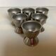 Six metal egg cups