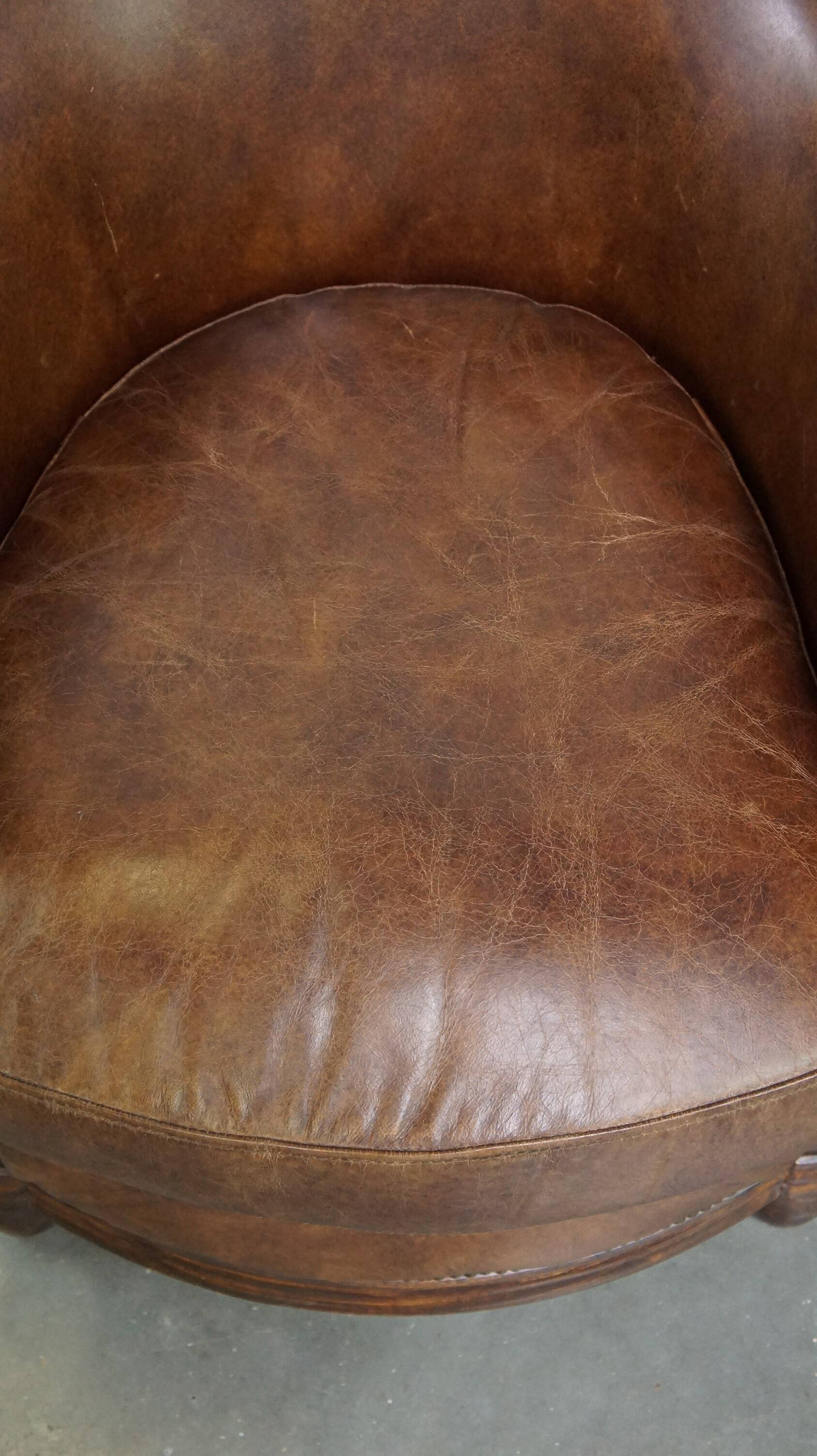 Set of 2 club chairs/armchairs in dark cognac leather