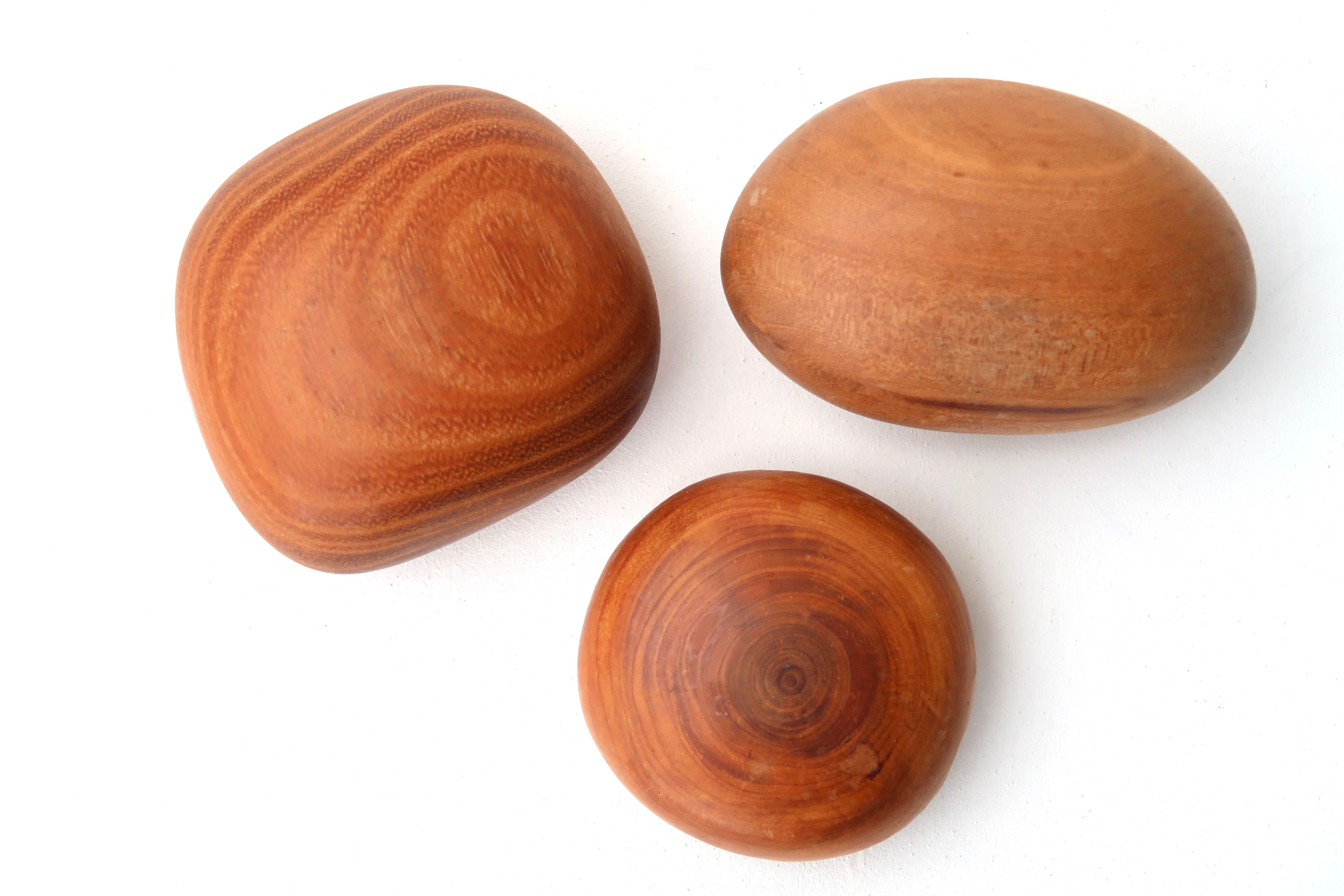 Wooden "pebble" paperweight, 70s