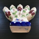 Fan vase with floral decoration