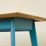 Blue compass foot table