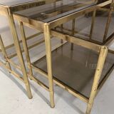 Set of three nesting tables in brass and smoked glass, 20th century
