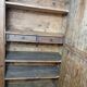 Antique rustic wardrobe in raw wood