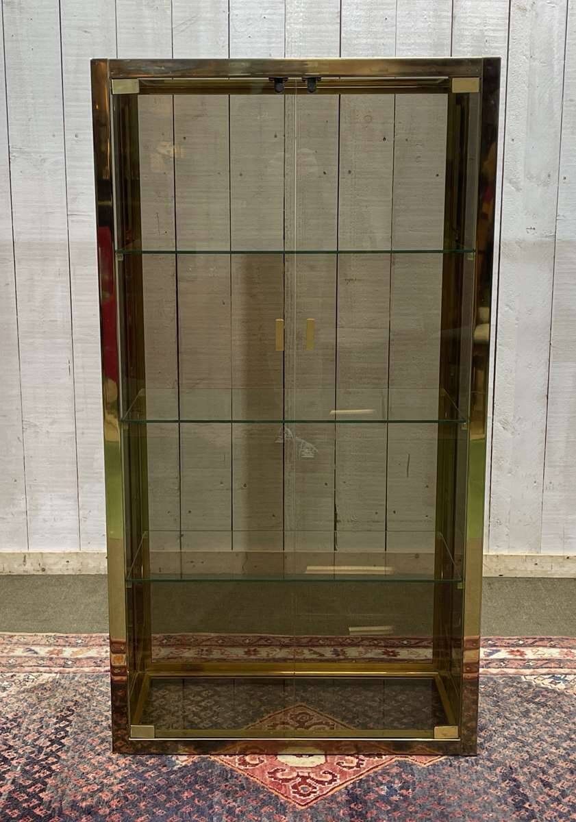 Exhibition showcase in gold-plated chrome and smoked glass - work from the 1980s.