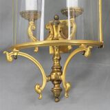 Lot de trois aplliques demi-lune en bronze doré & verre bombé