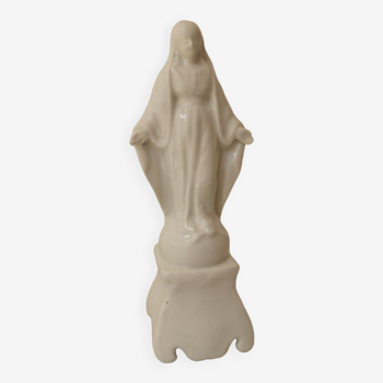 Statue of the Virgin Mary in white porcelain