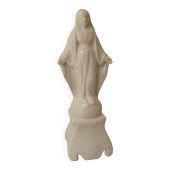 Statue of the Virgin Mary in white porcelain