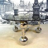 Space Age-style chromed steel round coffee table with glass top, 1960s