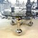 Space Age-style chromed steel round coffee table with glass top, 1960s