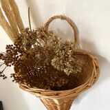 Braided wicker wall basket