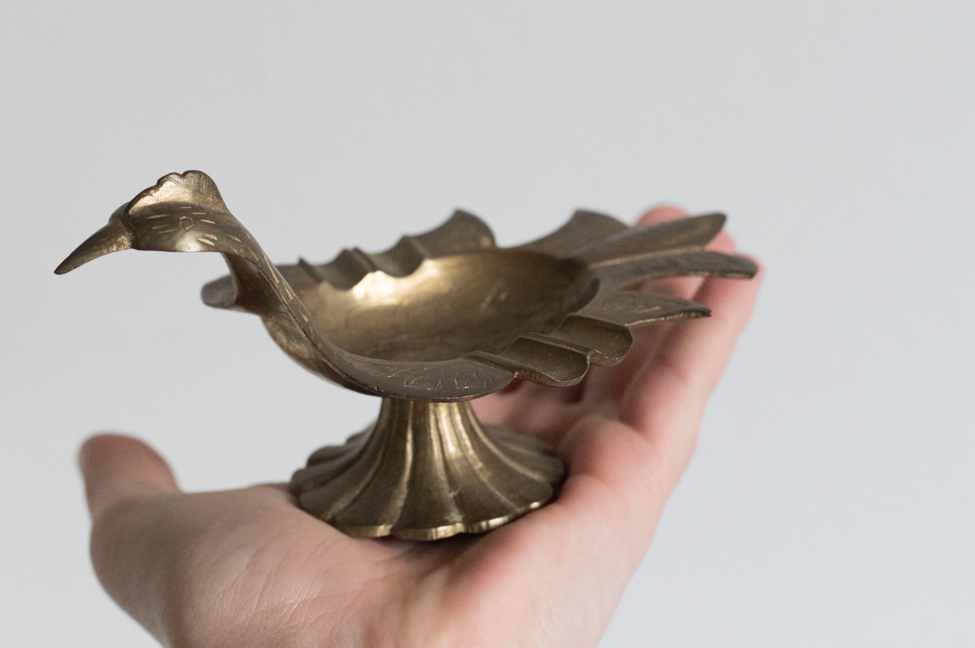 Empty pocket / old brass ashtray