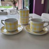4 cups, 2 under cups yellow and white tea towel pattern