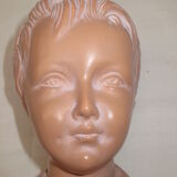 Old bust of a child in platre