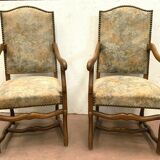 Pair of renaissance style armchairs in tinted beech XX century
