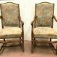 Paire de fauteuils de style renaissance en hêtre teinté XX siècle