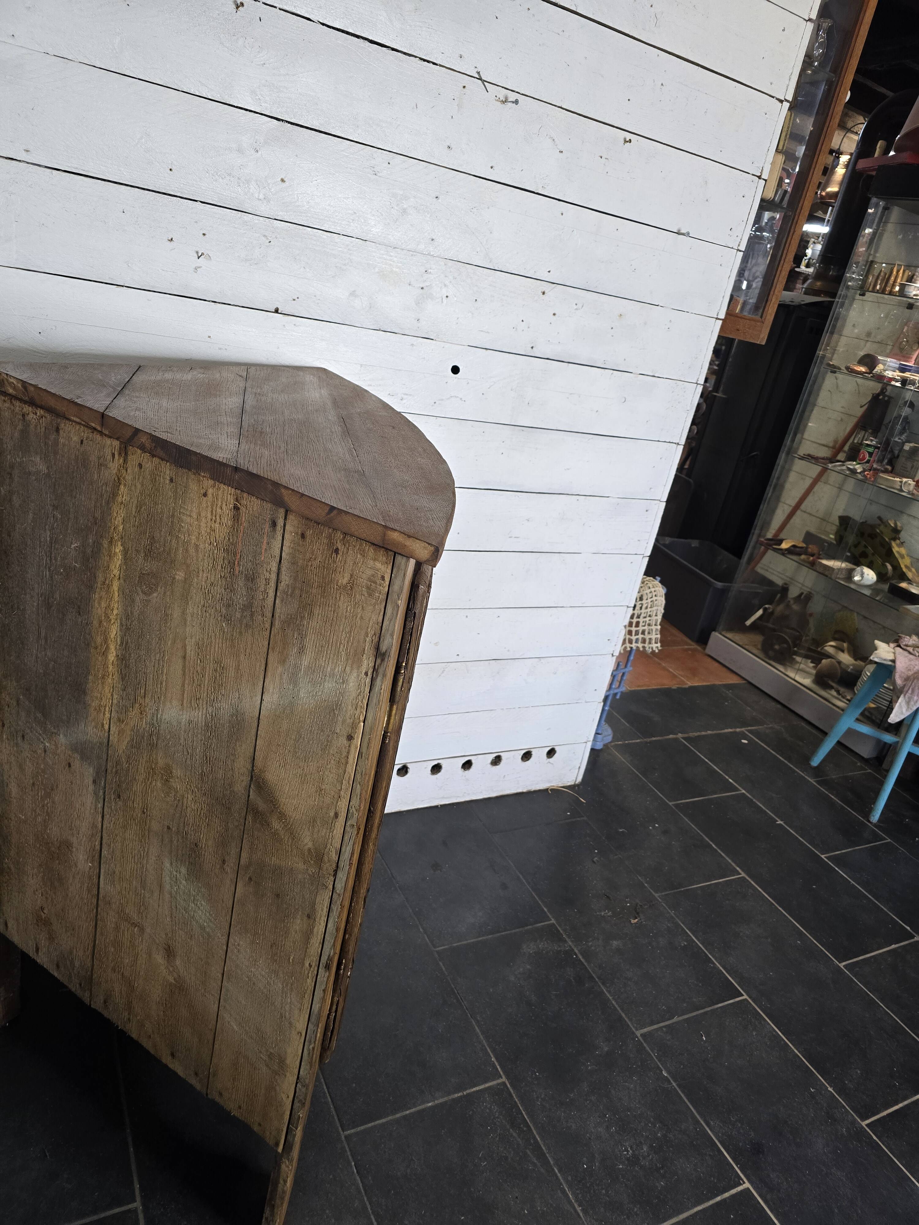 19th century curved corner cupboard in oak