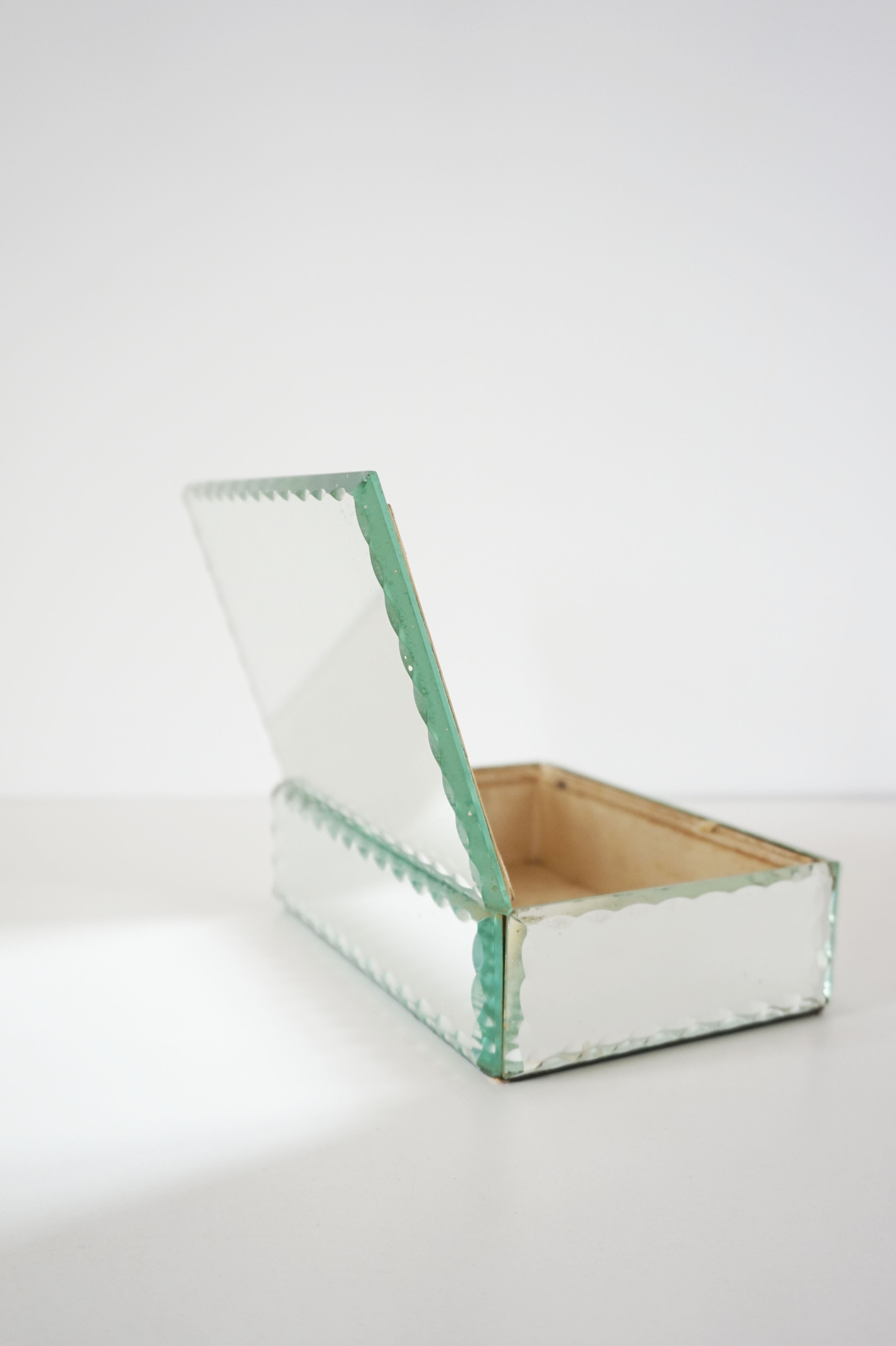 Jewelry box in chiseled mirror