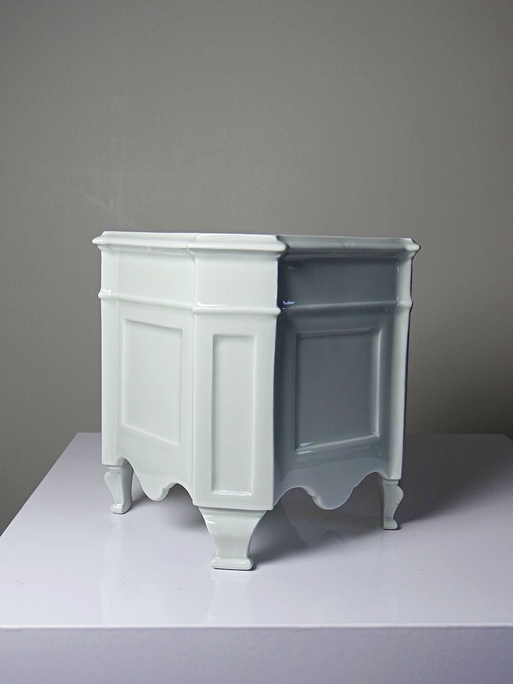 Square cache-pot with feet in celadon Limoges porcelain, Rococo style.