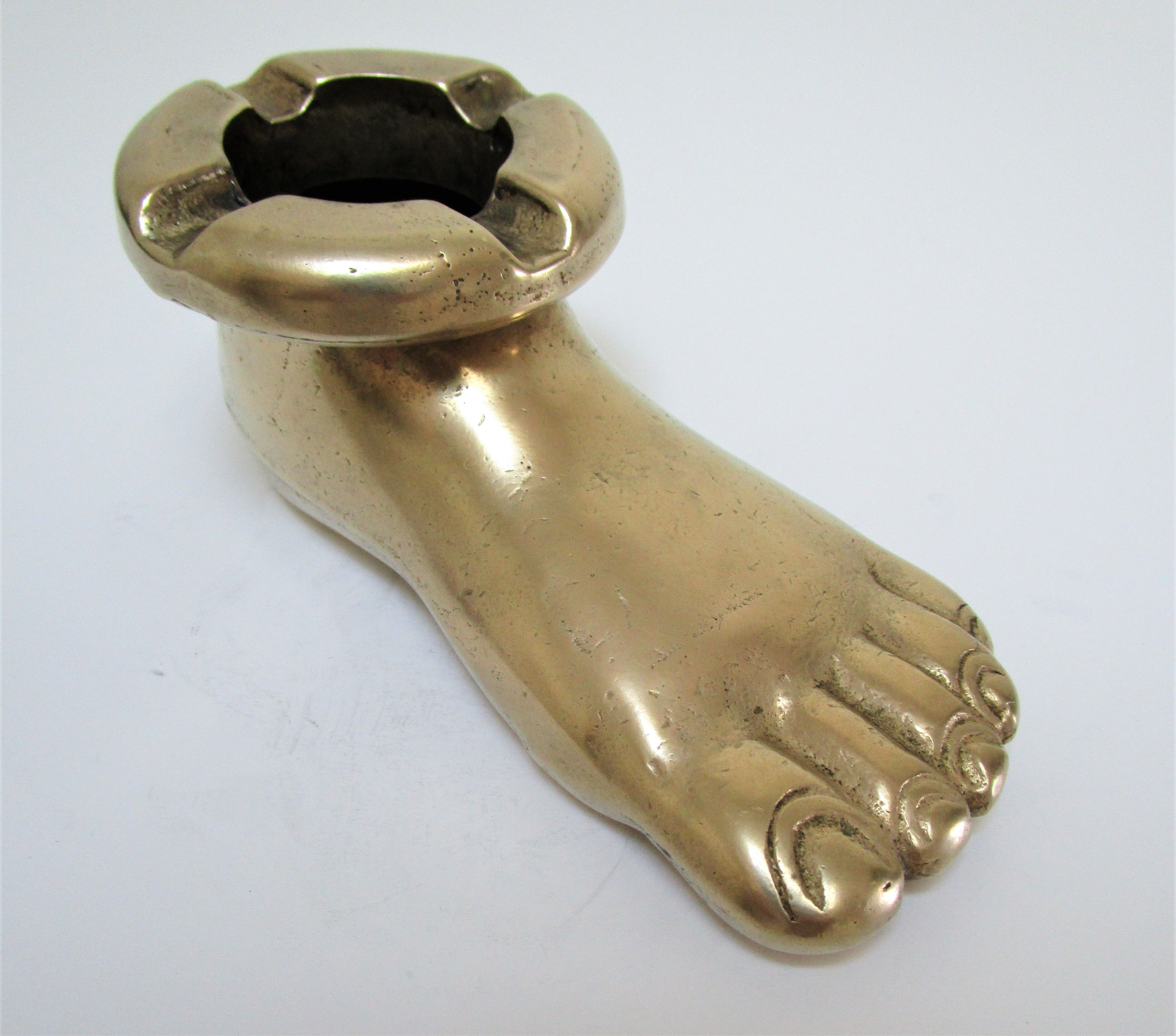 Anthropomorphic ashtray solid brass foot design 70s