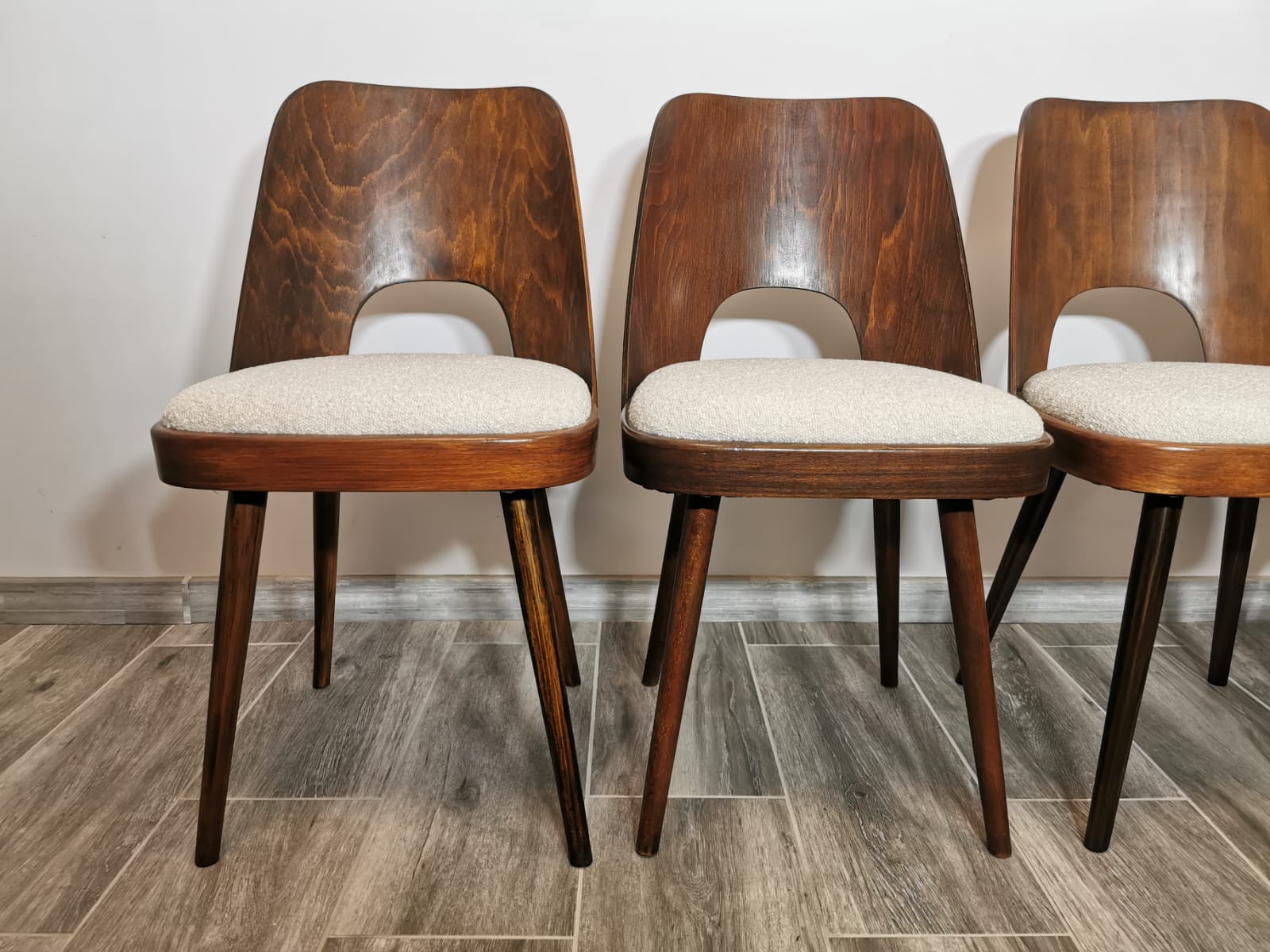 Dining chairs by Oswald Haerdtl