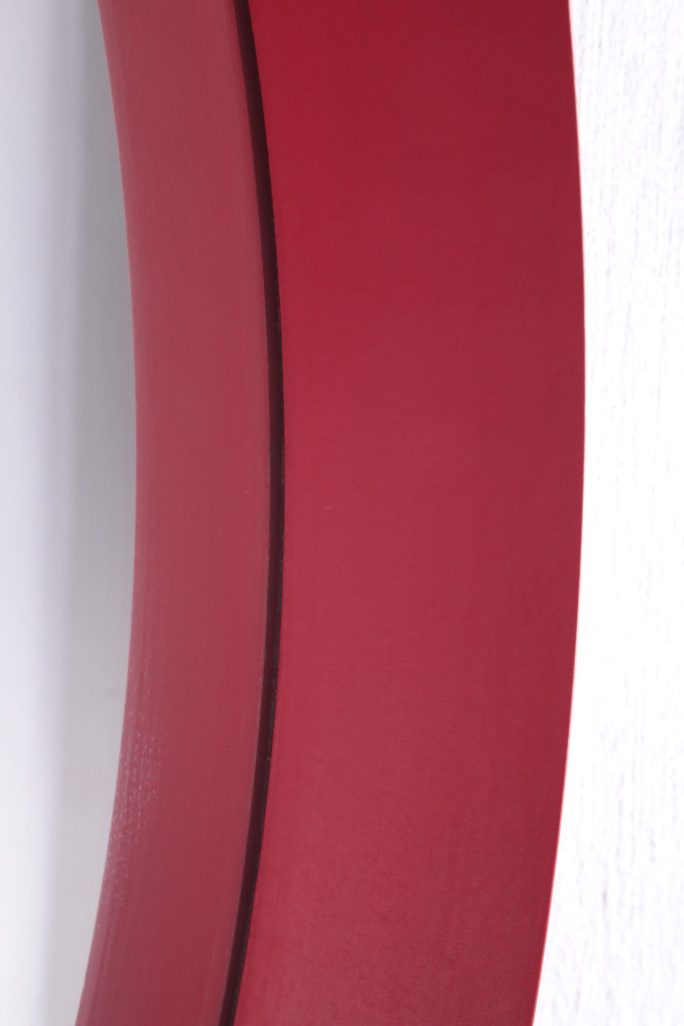 Vintage red round plastic mirror from the 1960s.