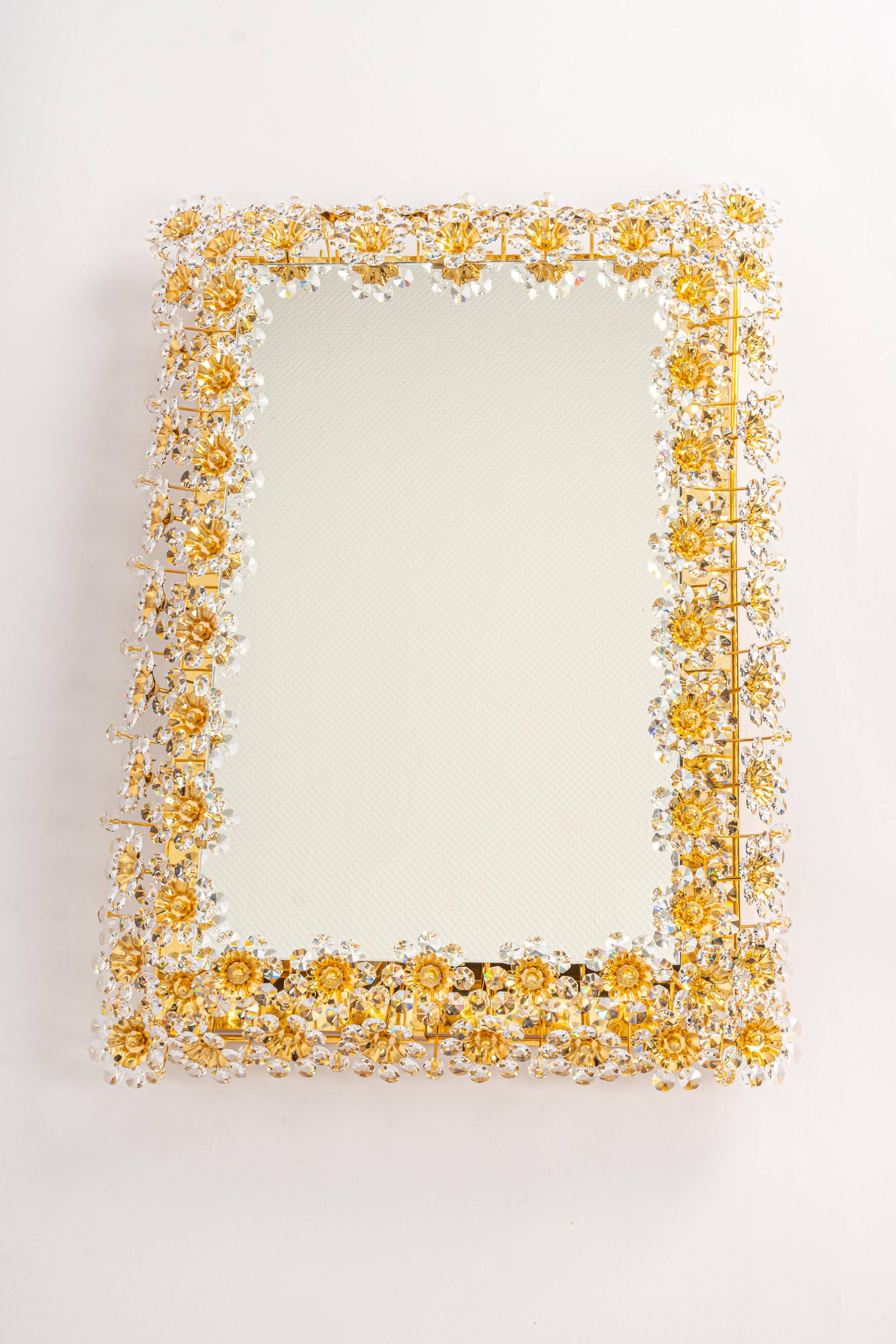 Spectacular backlit mirror in gilded brass and crystal glass by Palwa, Germany.