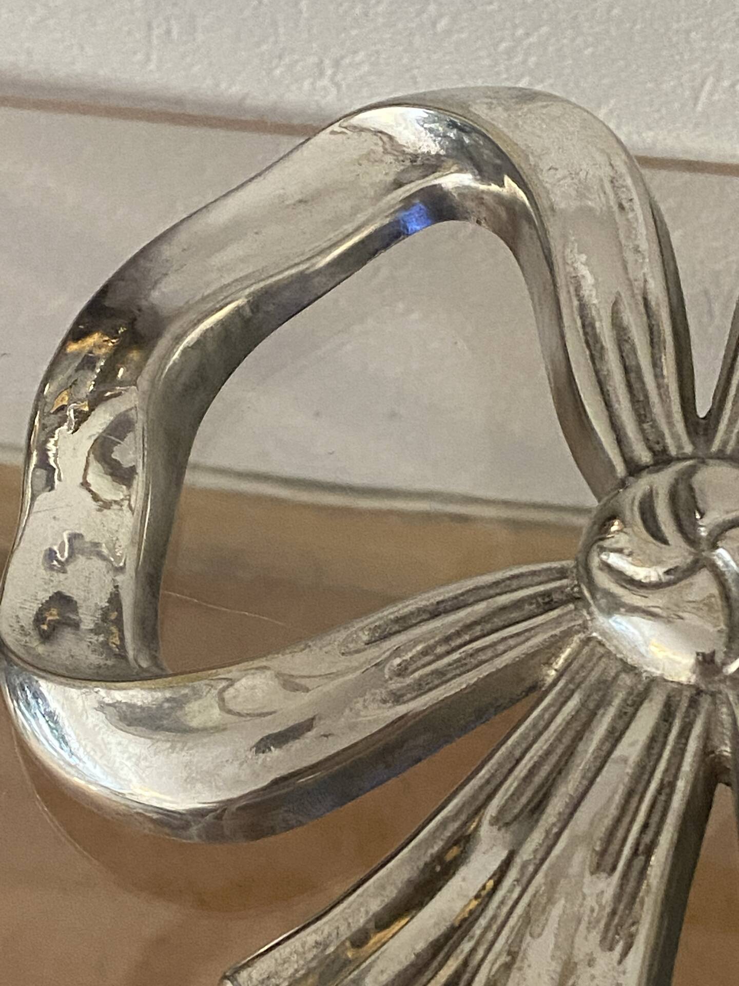 Lancel trivet, bow and ribbon, silver-plated metal