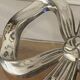 Lancel trivet, bow and ribbon, silver-plated metal