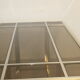 Dining table in chrome-plated steel and brass by Romeo Rega circa 1970