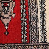 Tapis vintage fait main Bukhara de prière en laine rouge (45cm x 101cm)