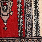 Tapis vintage fait main Bukhara de prière en laine rouge (45cm x 101cm)