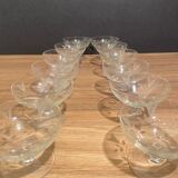 Suite of 12 champagne glasses in cut glass with floral decoration