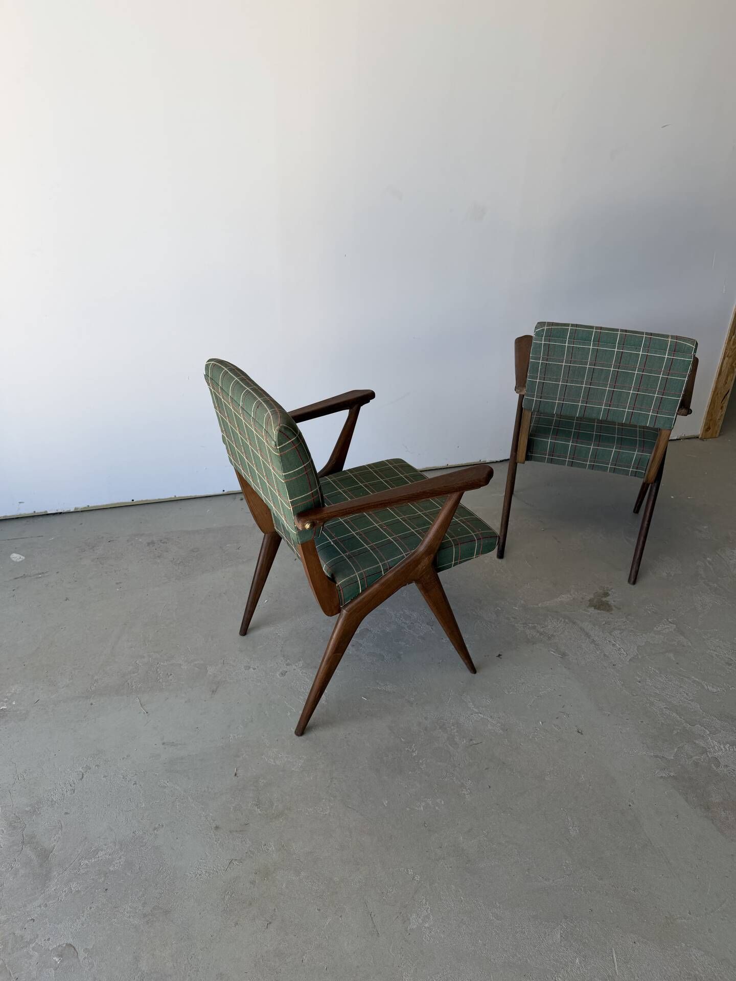 Pair of armchairs with a Scandinavian design in vintage teak from the 1960s.