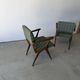 Pair of armchairs with a Scandinavian design in vintage teak from the 1960s.