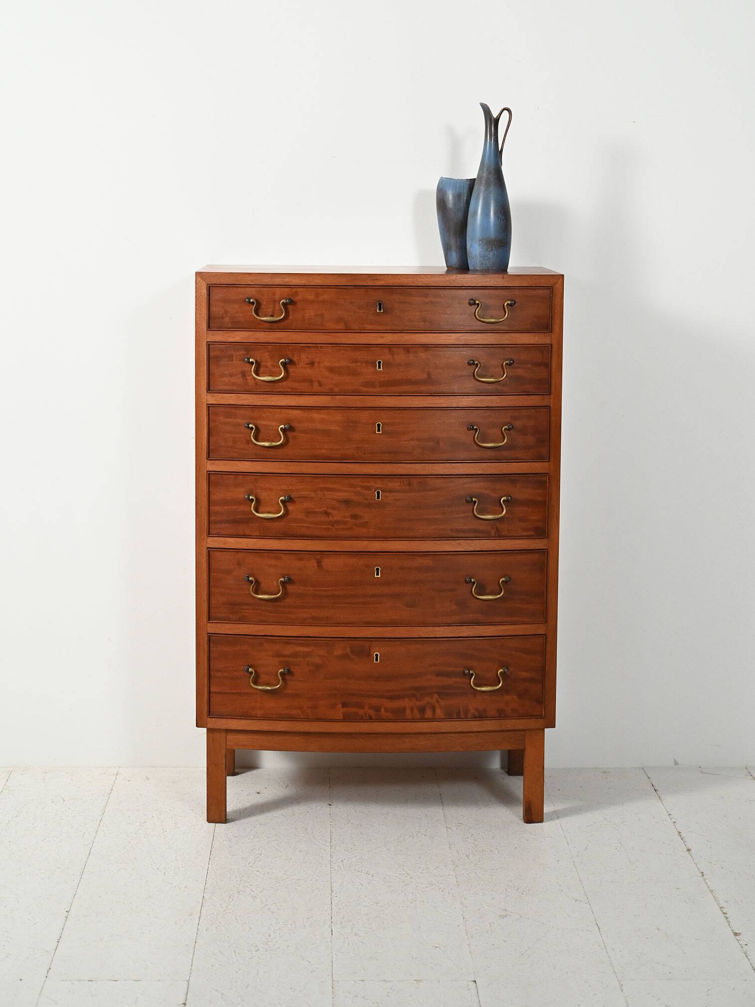Scandinavian mahogany tallboy with brass handles