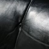 Pollock black leather reclining armchair with fixed ends