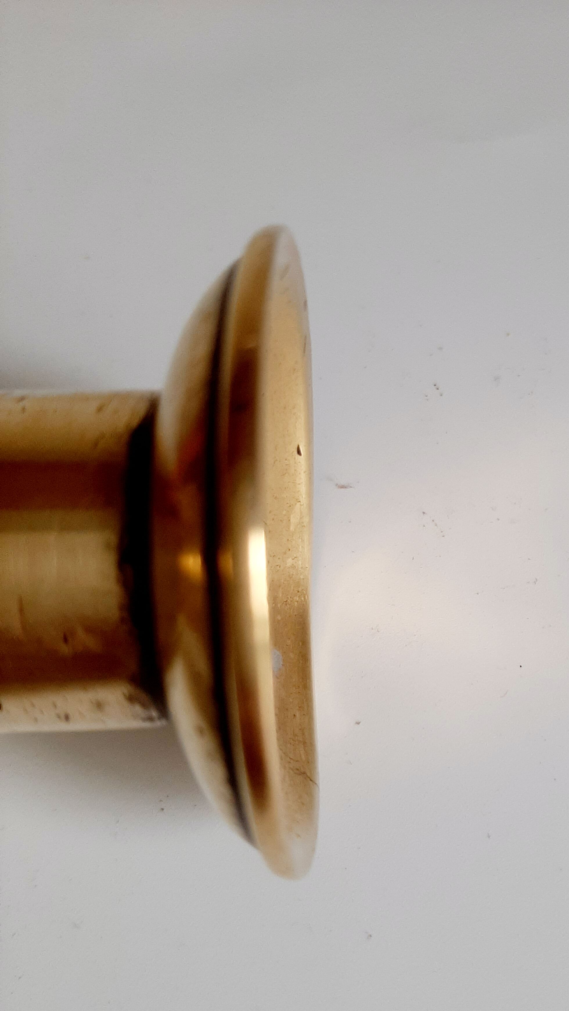 Golden brass candle holder