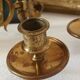Pair of antique wall-mounted brass candle holders