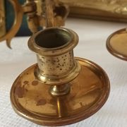 Pair of antique wall-mounted brass candle holders