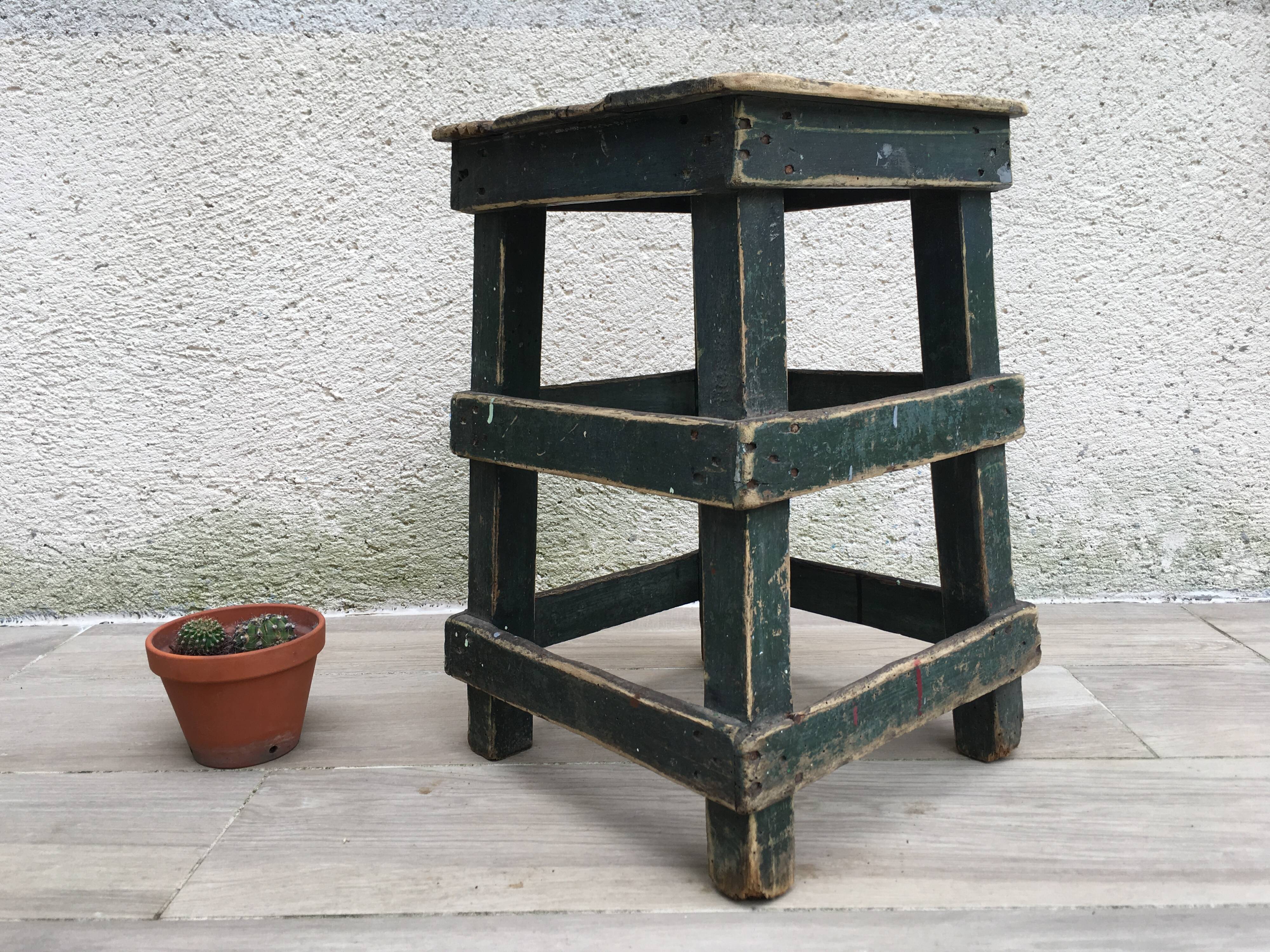 Former green workshop stool